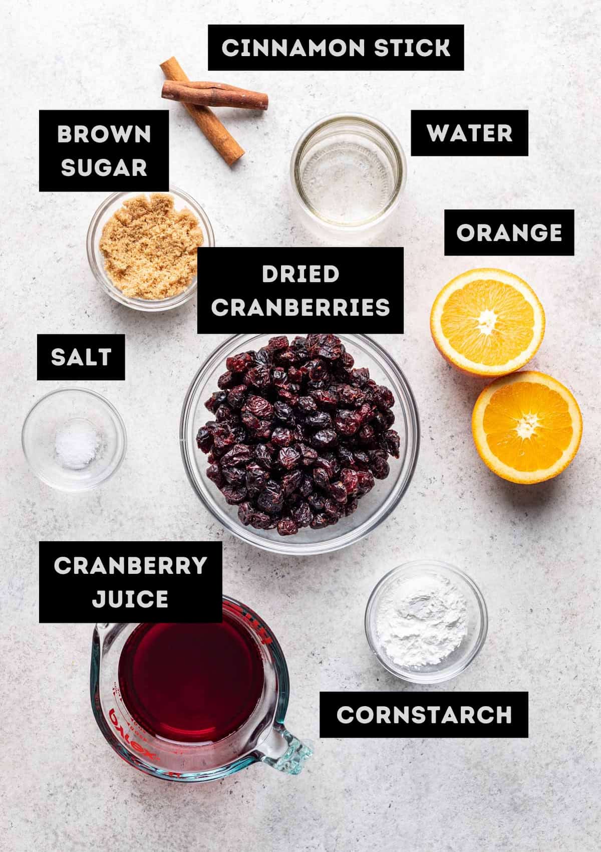 Labelled ingredients for cranberry sauce with dried cranberries (see recipe for details).
