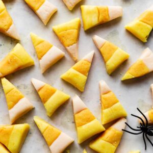 Homemade candy corn on a white backdrop.