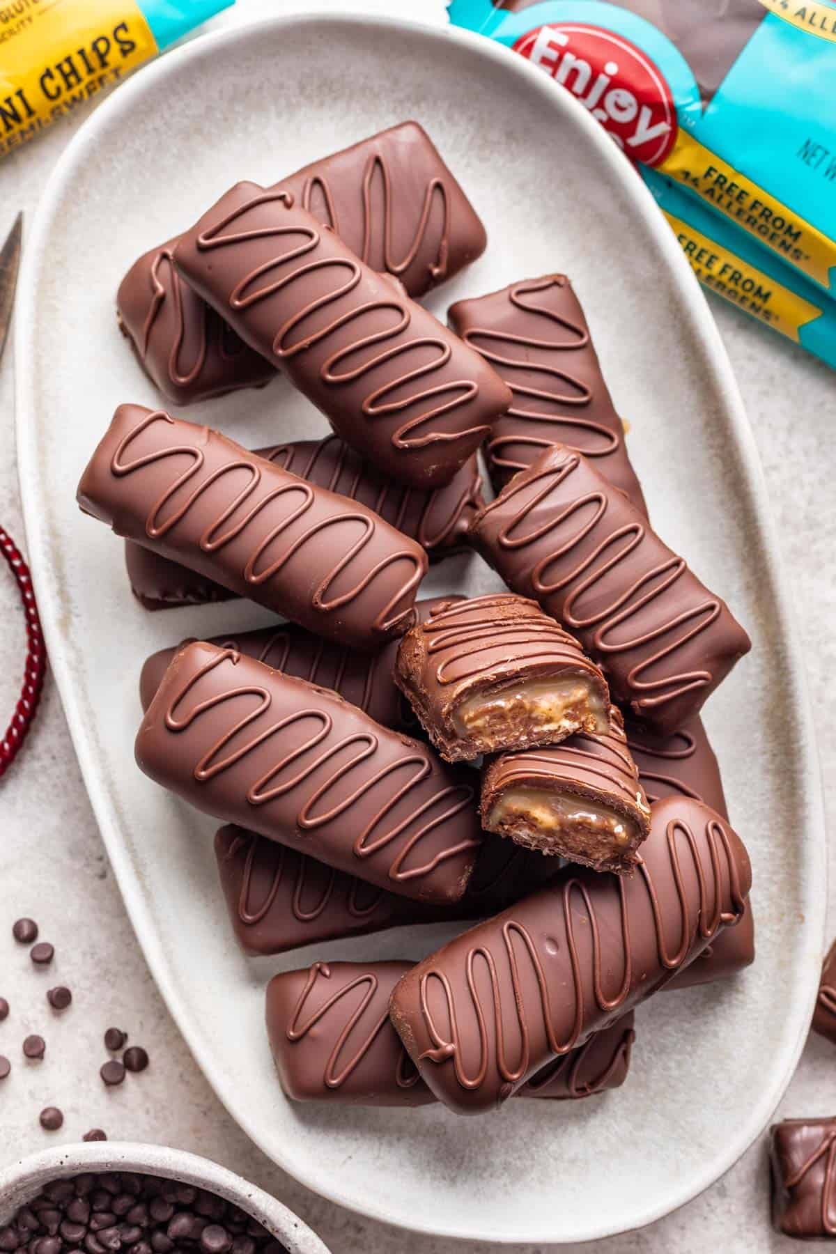 Allergy friendly milky way bars stacked on a serving dish.