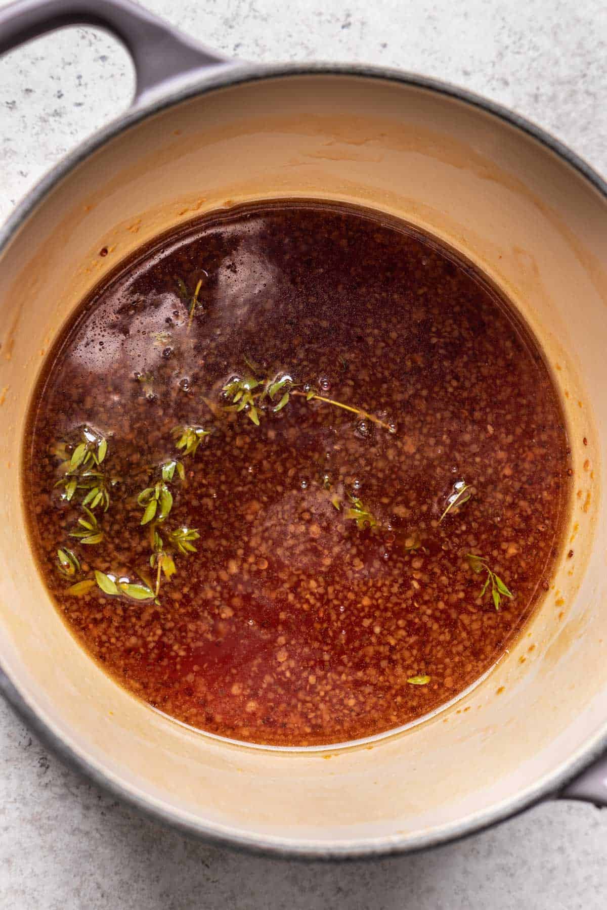 Honey glaze in a saucepan.