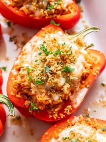 Ground Chicken Stuffed Peppers in a white baking dish.
