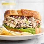 Cranberry Pecan Chicken Salad on a sandwich with crisp lettuce.