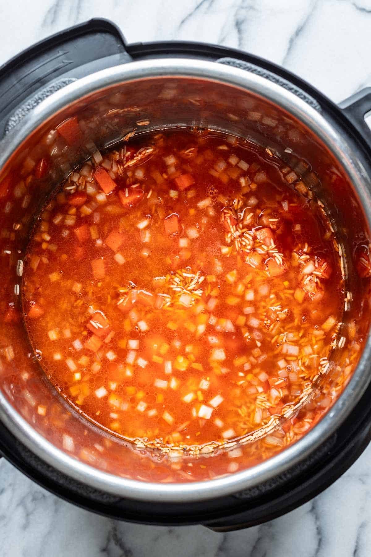 Broth added to the instant pot.
