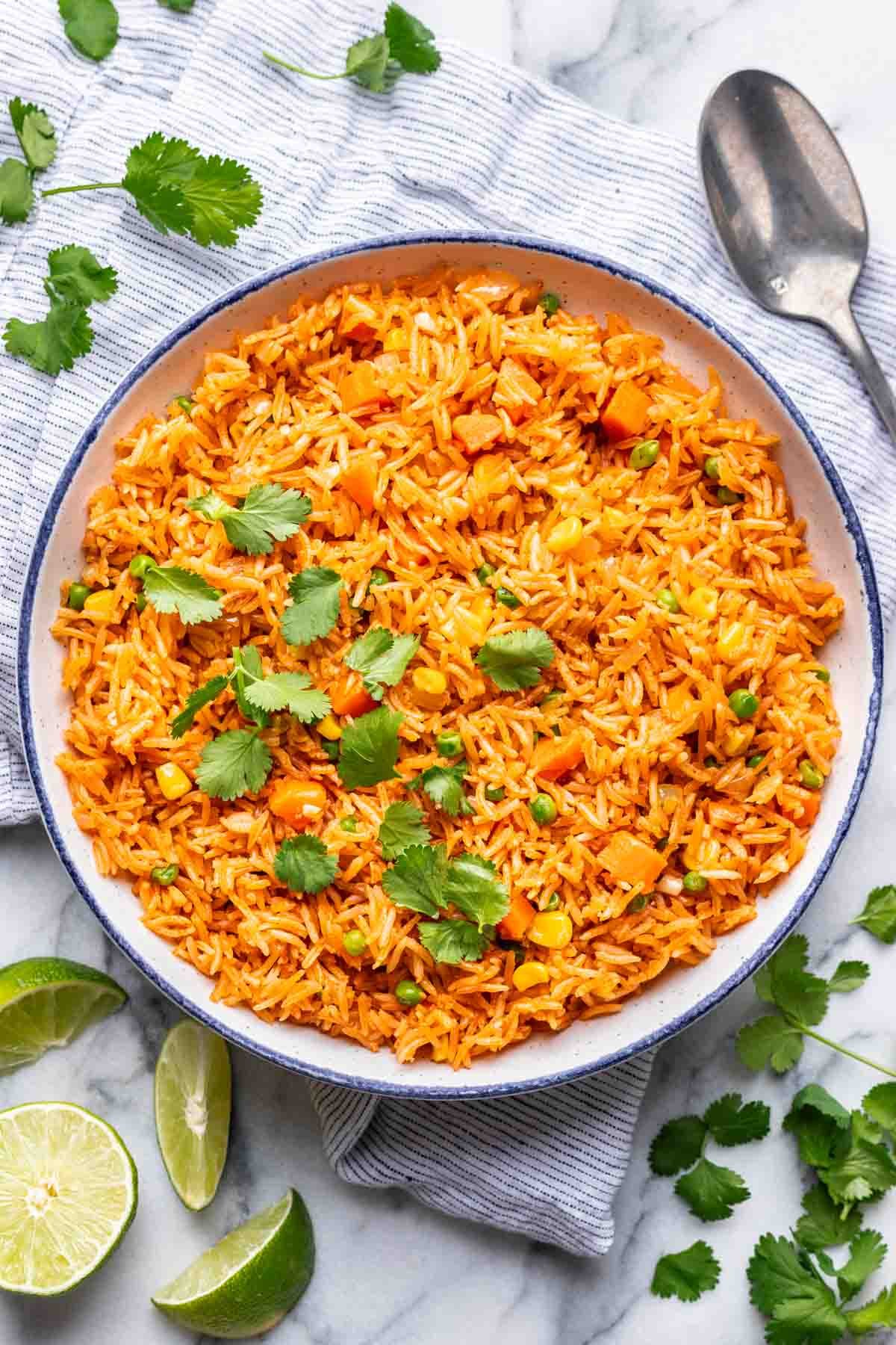 Instant pot mexican rice in a serving bowl, garnished with fresh cilantro.