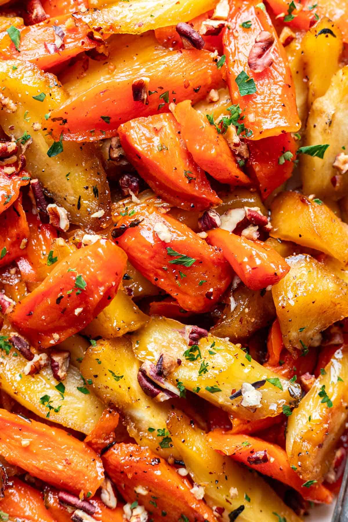A close up of maple glazed carrots and parsnips.