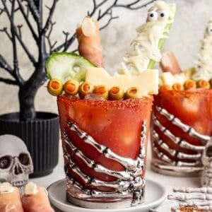 Halloween bloody mary topped with festive spooky food decorations.