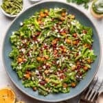 Roasted green bean and butternut squash salad in a blue serving bowl.