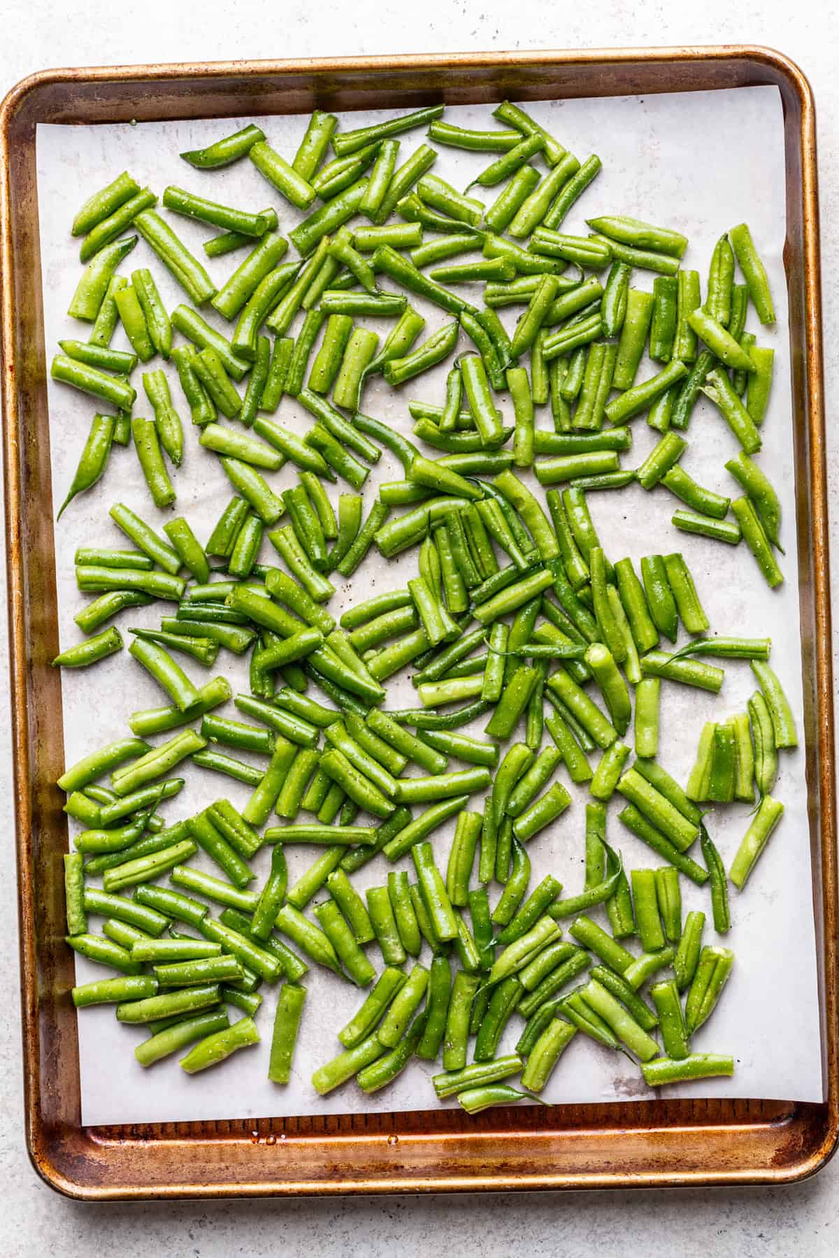Green beans on a baking sheet.