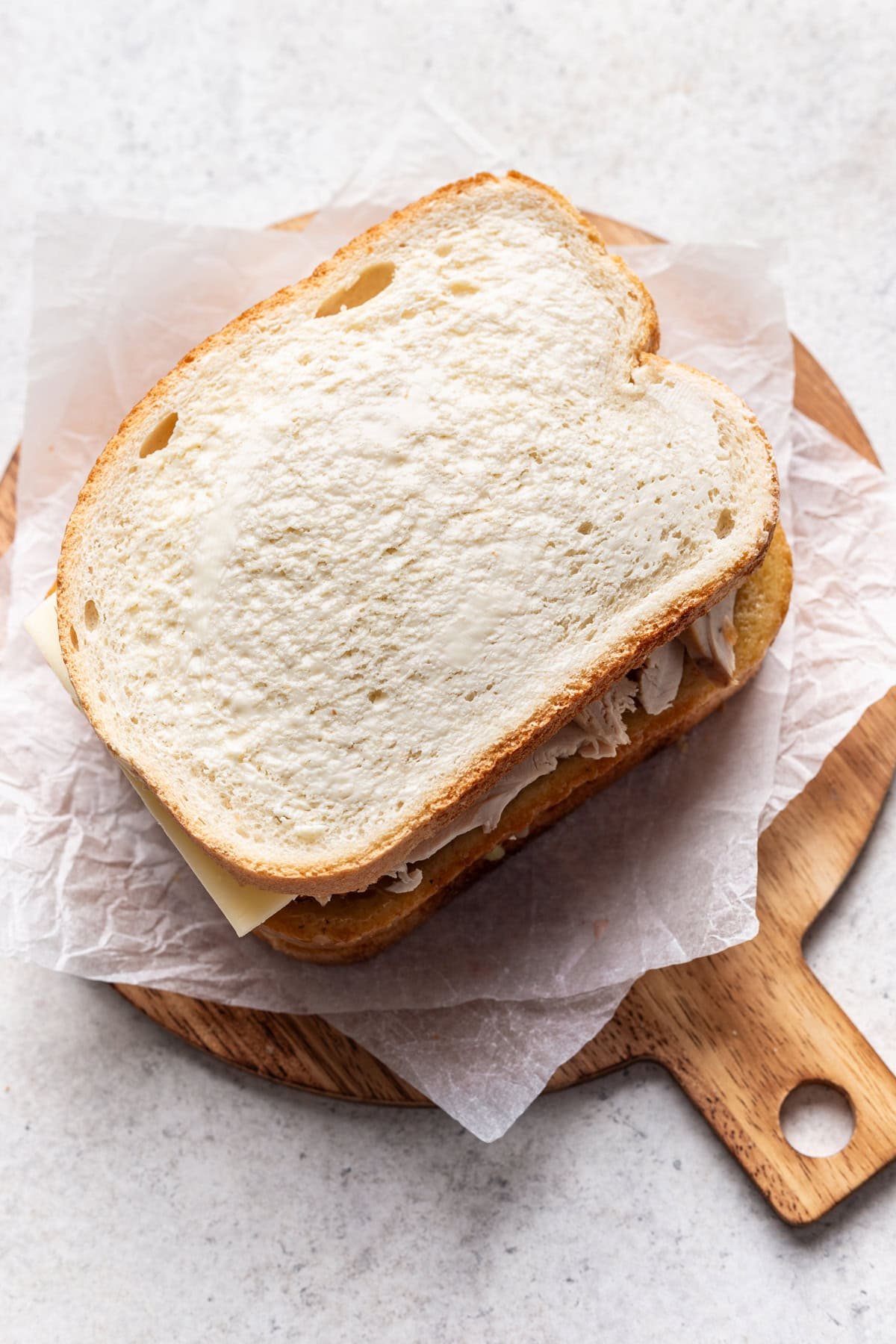 Assembled sandwich before getting pressed in the panini press.