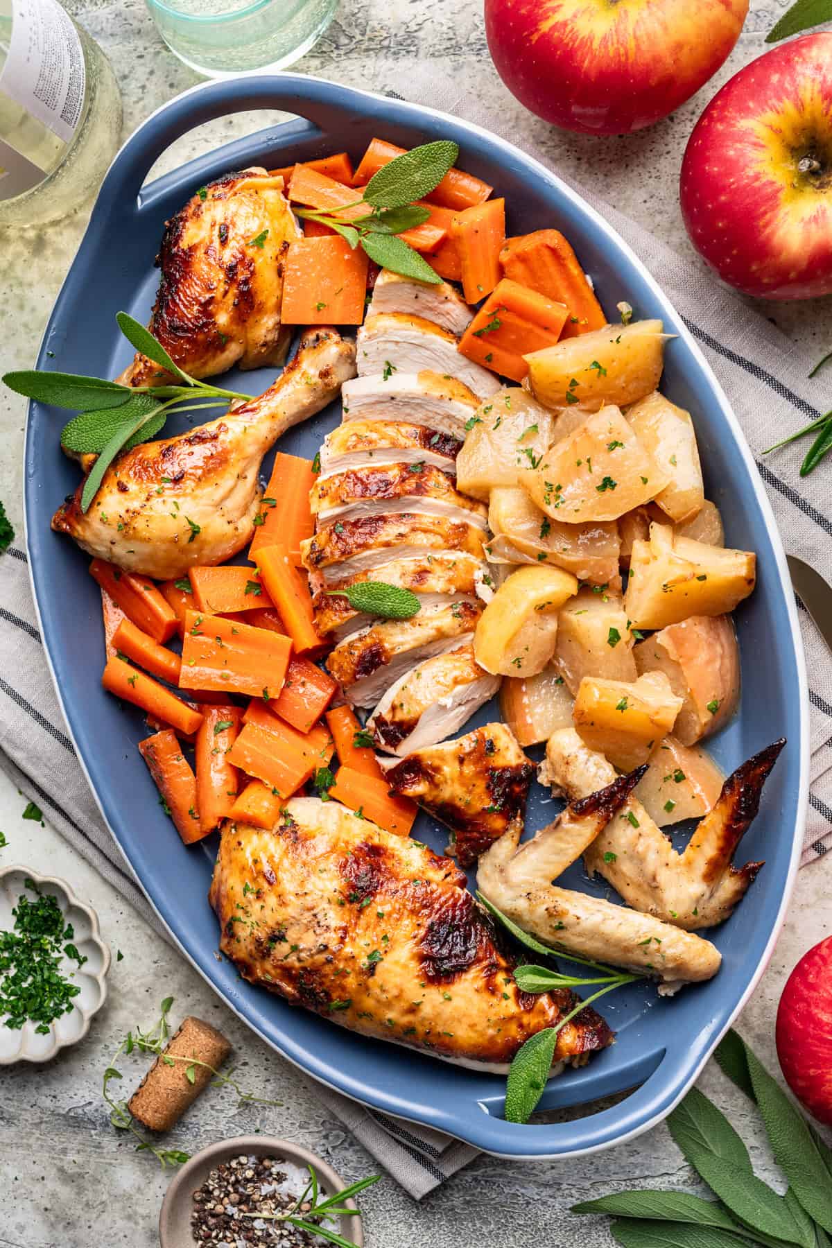 Sliced Thanksgiving chicken on a blue serving platter.