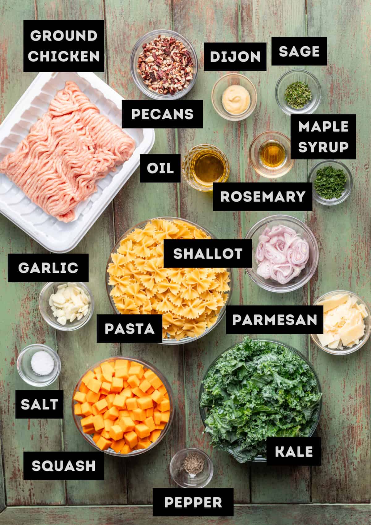 Labelled ingredients for roasted butternut squash pasta with ground chicken and kale (see recipe for details).