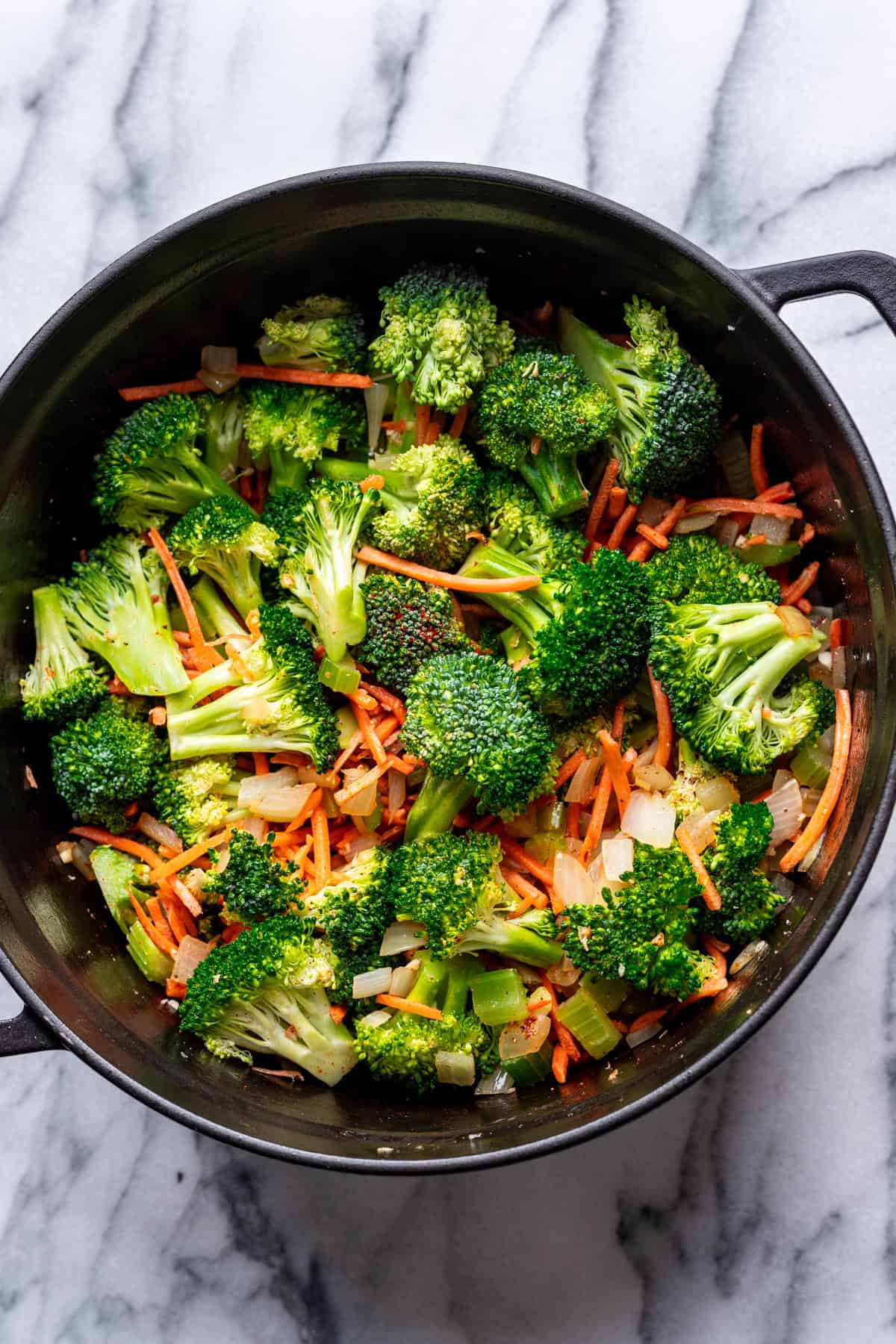 Broccoli and carrots added to the pot.