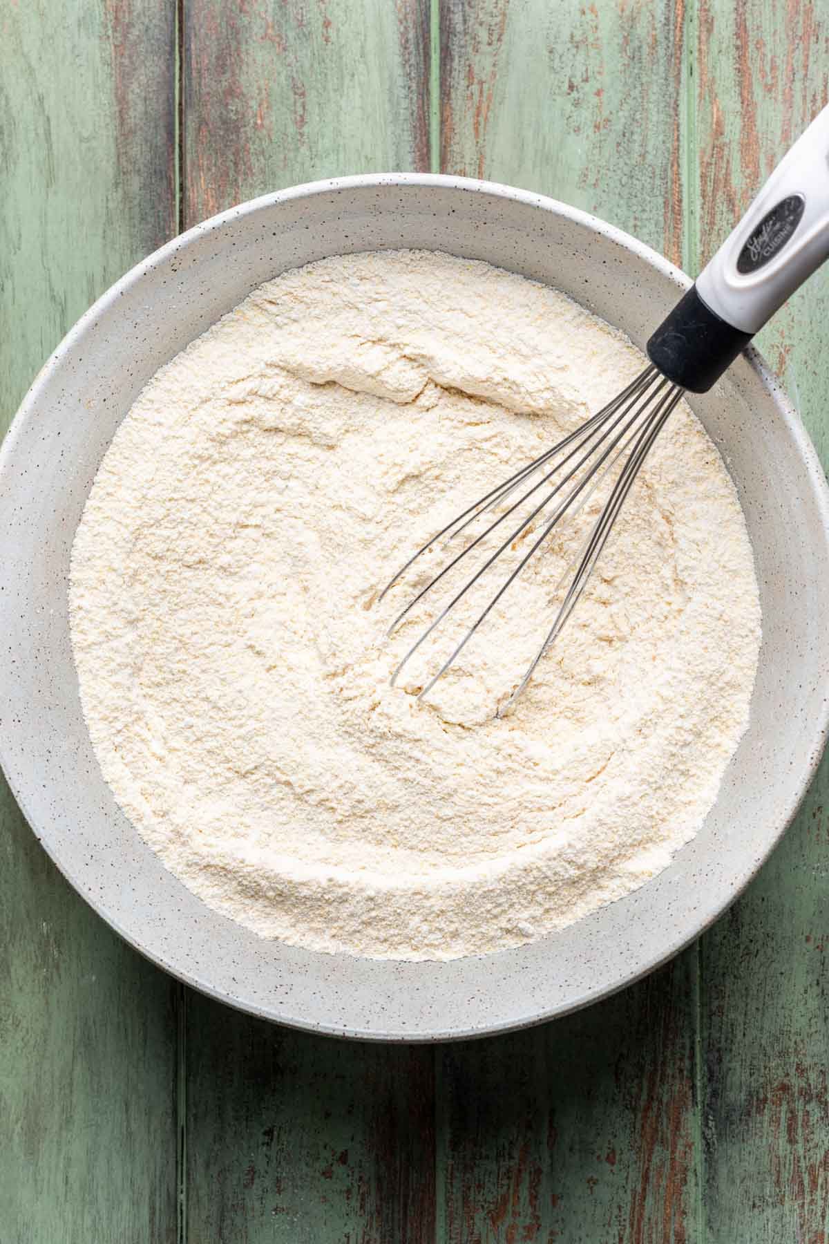Dry ingredients whisked in a bowl.