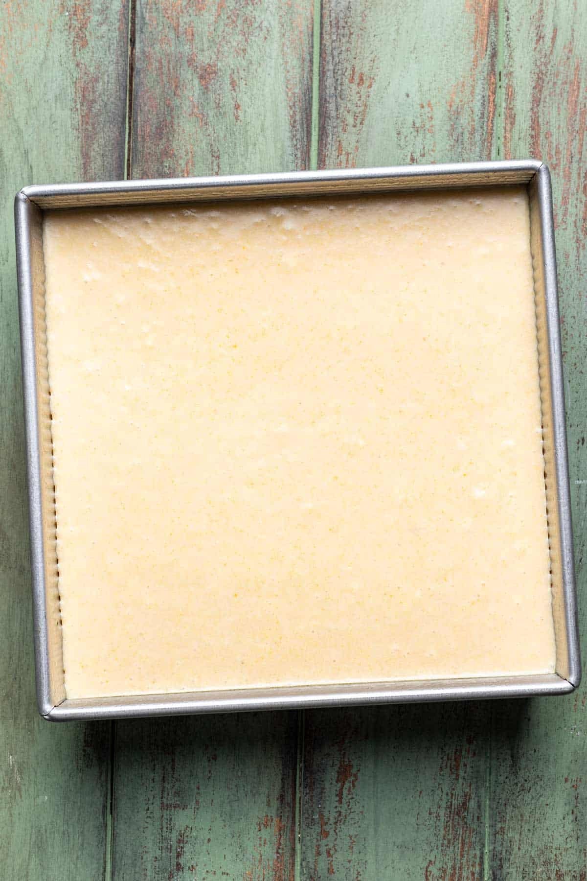 Cornbread batter in the baking pan prior to baking.